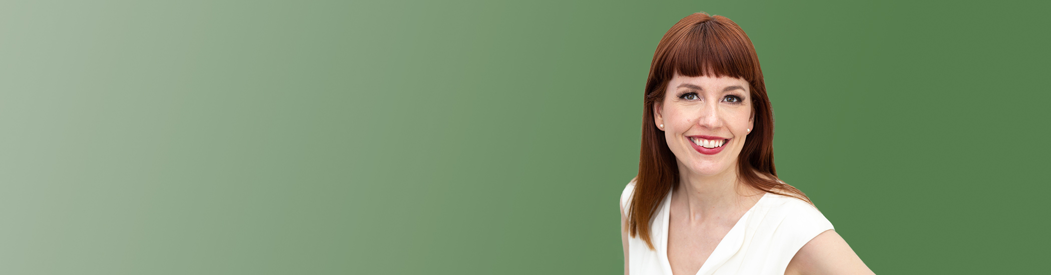 Photo of Ashlie Corcoran smiling with a green gradient background.