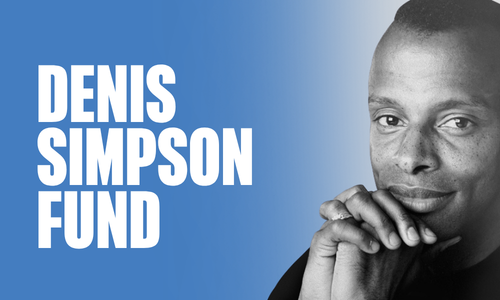Denis Simpson rests his head on his hands.